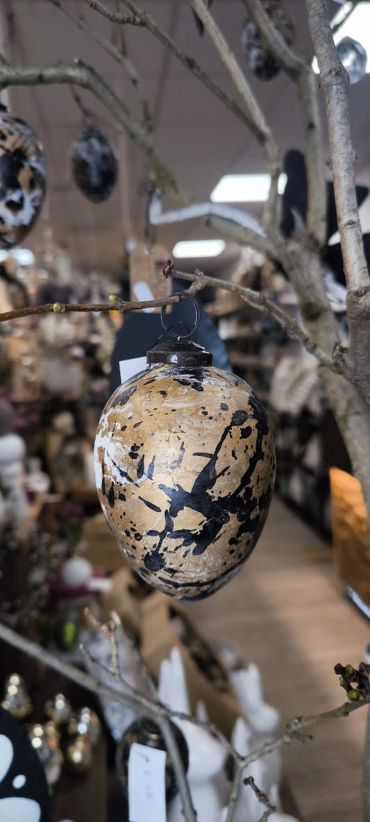 Keramisches Osterei in edlem Gold - Schwarz mit weißen Abnutzungseffekten - Yucca Deko